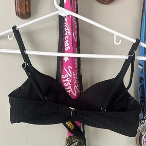 Black ribbed xhilaration bikini top size XS.